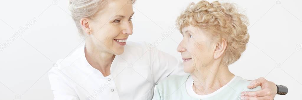 Nurse comforting her patient