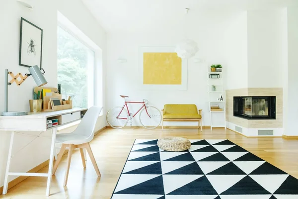 Spacious interior with yellow settee