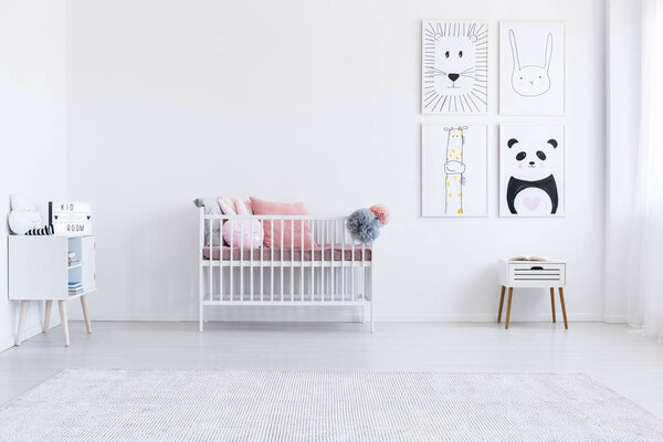 Pink pillows on girl's bed