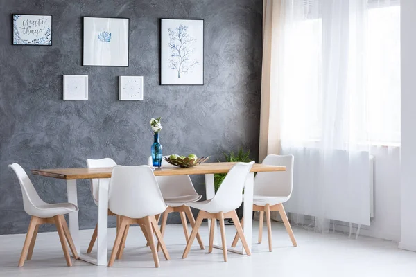 Bright dining room with paintings — Stock Photo, Image