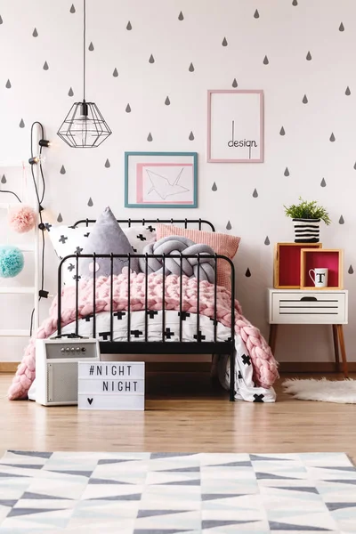 Kid\'s bedroom with creative wallpaper