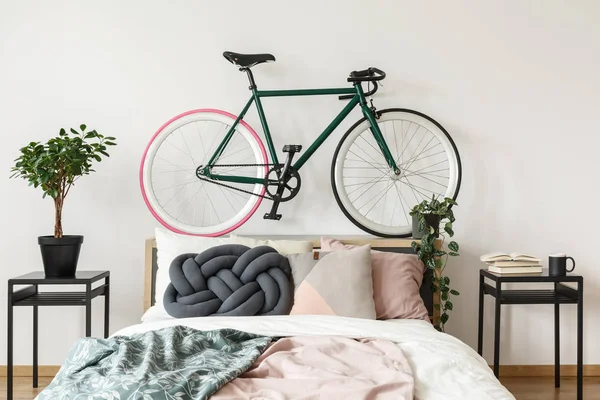 Black bike in bedroom