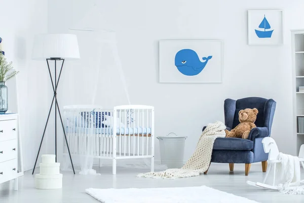 White and blue baby's bedroom