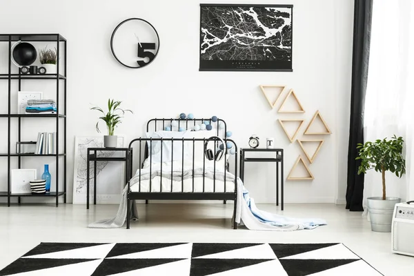 Monochromatic teenager's bedroom with clock — Stock Photo, Image