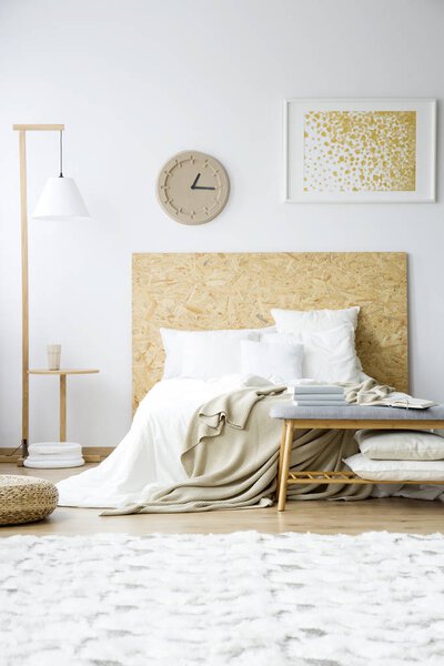 Paper clock in natural bedroom