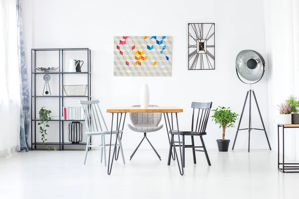 Dining table in loft space — Stock Photo, Image