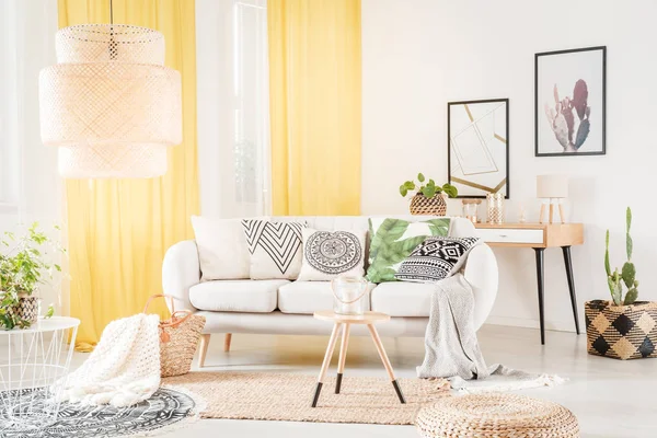 Patterned pillows lying on sofa — Stock Photo, Image