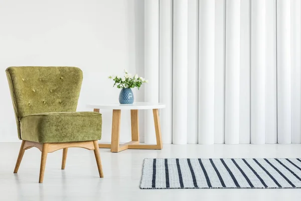 Green armchair in living room — Stock Photo, Image