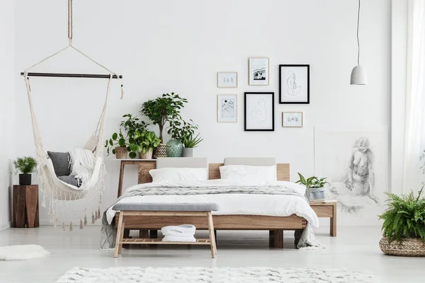 Natural bedroom with posters — Stock Photo, Image