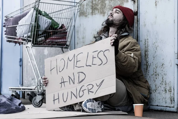 Desperate homeless and hungry tramp — Stock Photo, Image