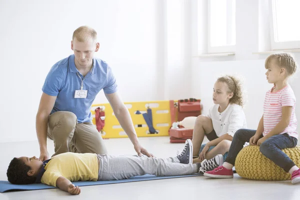 Boy during first aid training