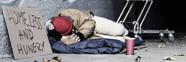 Dirty vagrant begging for food — Stock Photo, Image