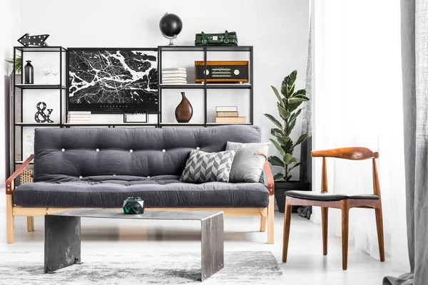 Black sofa in living room — Stock Photo, Image