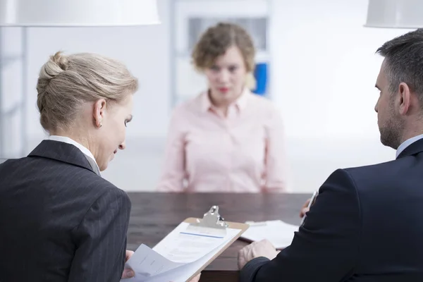 Headhunters looking at candidate references — Stock Photo, Image