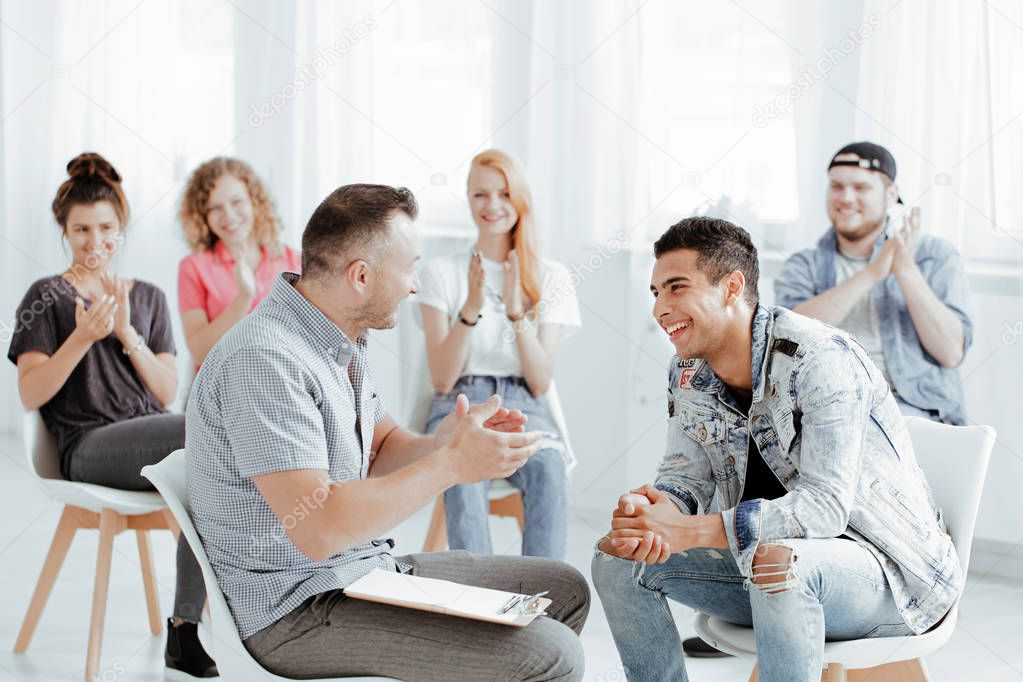 Psychologist and patients laughing