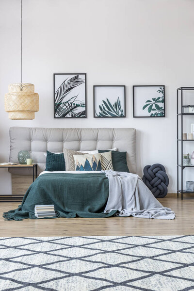 Green and grey bedroom interior