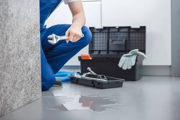 Plumber with wrench — Stock Photo, Image