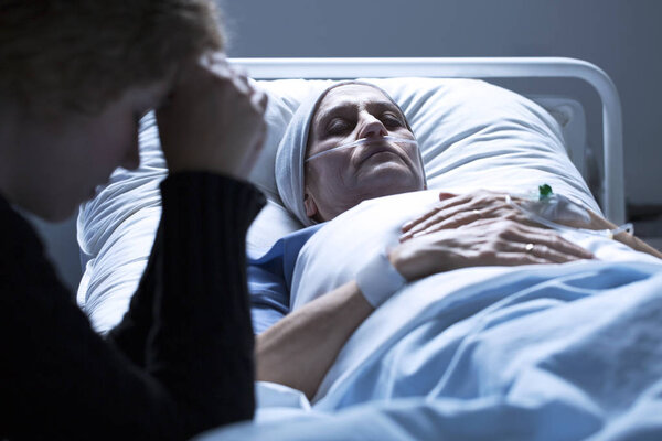 Woman dying in hospital