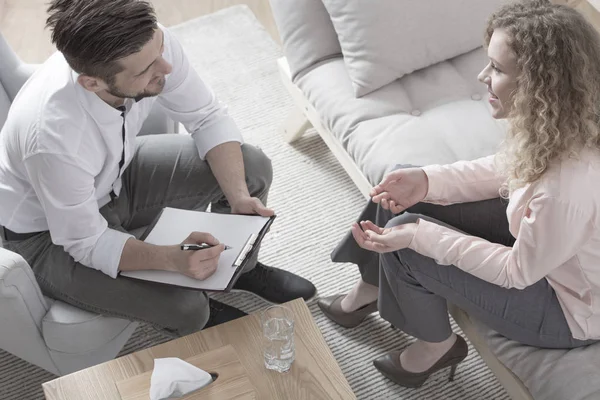 Smiling businesswoman and financial counselor — Stock Photo, Image