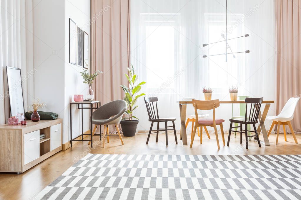 Spacious dining room with drapes