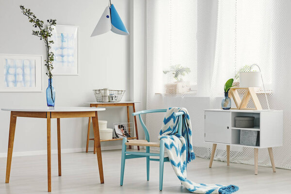 Bright dining space with twig