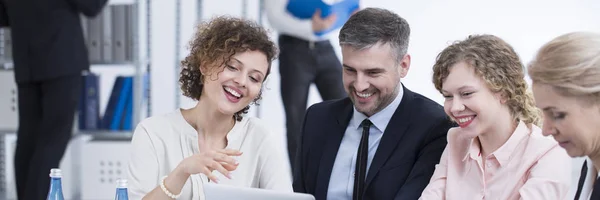 Smiling recruiters reading resumes — Stock Photo, Image