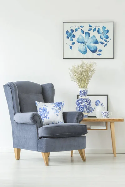 Comfy armchair in white room — Stock Photo, Image