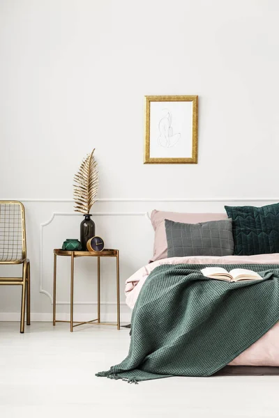 Gold and green bedroom interior