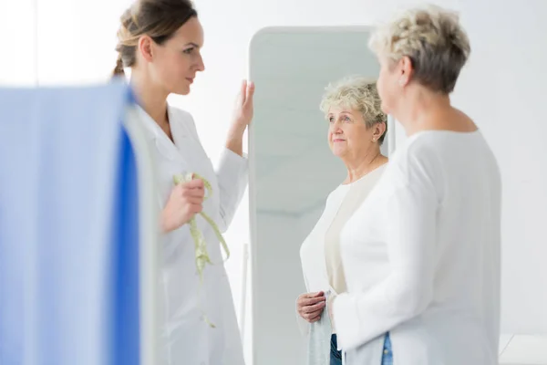 Dietician and woman with overweight — Stock Photo, Image