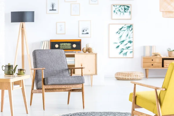 Grey wooden armchair in interior — Stock Photo, Image