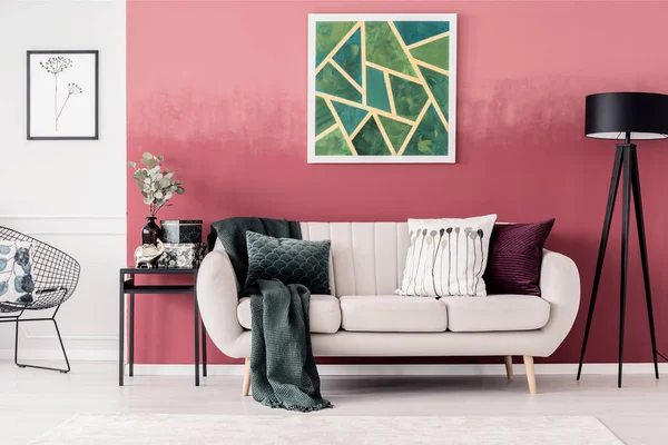 Sofa and geometric painting — Stock Photo, Image