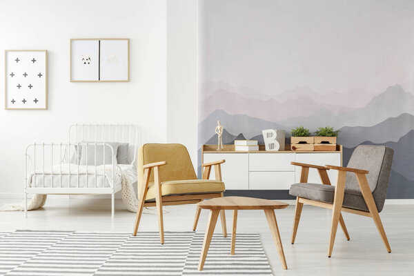 Kids bedroom with armchairs