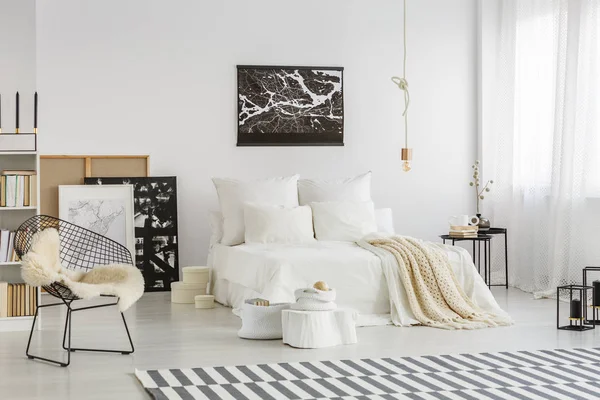 Spacious Bedroom Interior Beige Blanket White Bed Fur Black Armchair — Stock Photo, Image