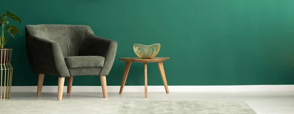 Elegant Golden Fruit Bowl Wooden Side Table Comfortable Armchair Teal — Stock Photo, Image