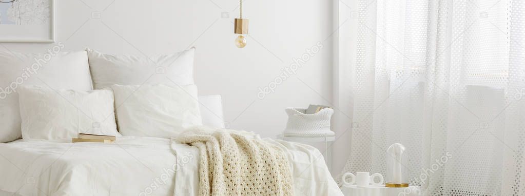 Simple lamp above bed