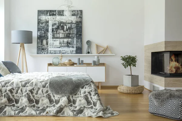 Warm bedroom interior with fireplace — Stock Photo, Image