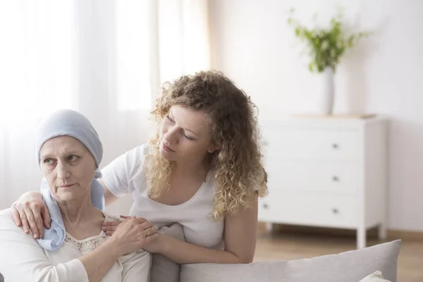 Young Caregiver Offering Support Older Woman Headscarf Sick Cancer Patient — Stock Photo, Image