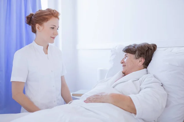Taking care of woman — Stock Photo, Image