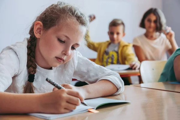 Girl in a classroom — Stock Photo, Image