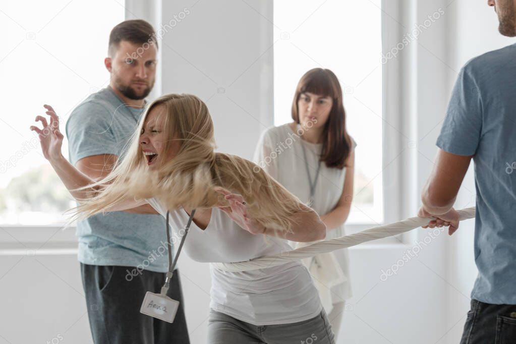 Young woman expressing her feelings during anger managment workshops