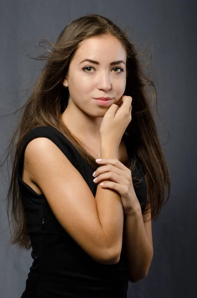 Beautiful girl in black dress — Stock Photo, Image