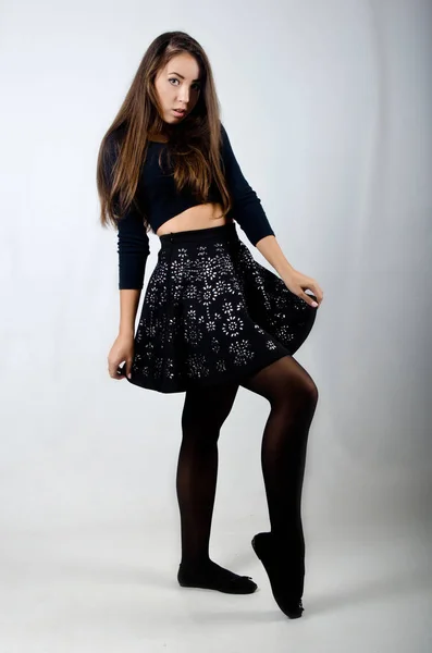 Beautiful girl in skirt and top — Stock Photo, Image