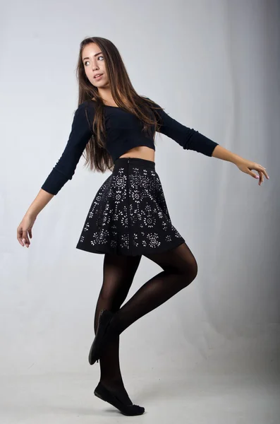 Beautiful girl in skirt and top — Stock Photo, Image