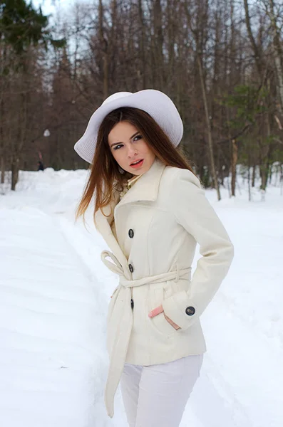 Beautiful girl in a coat — Stock Photo, Image