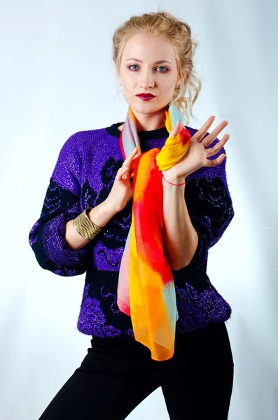 Beautiful girl in colorful scarf — Stock Photo, Image