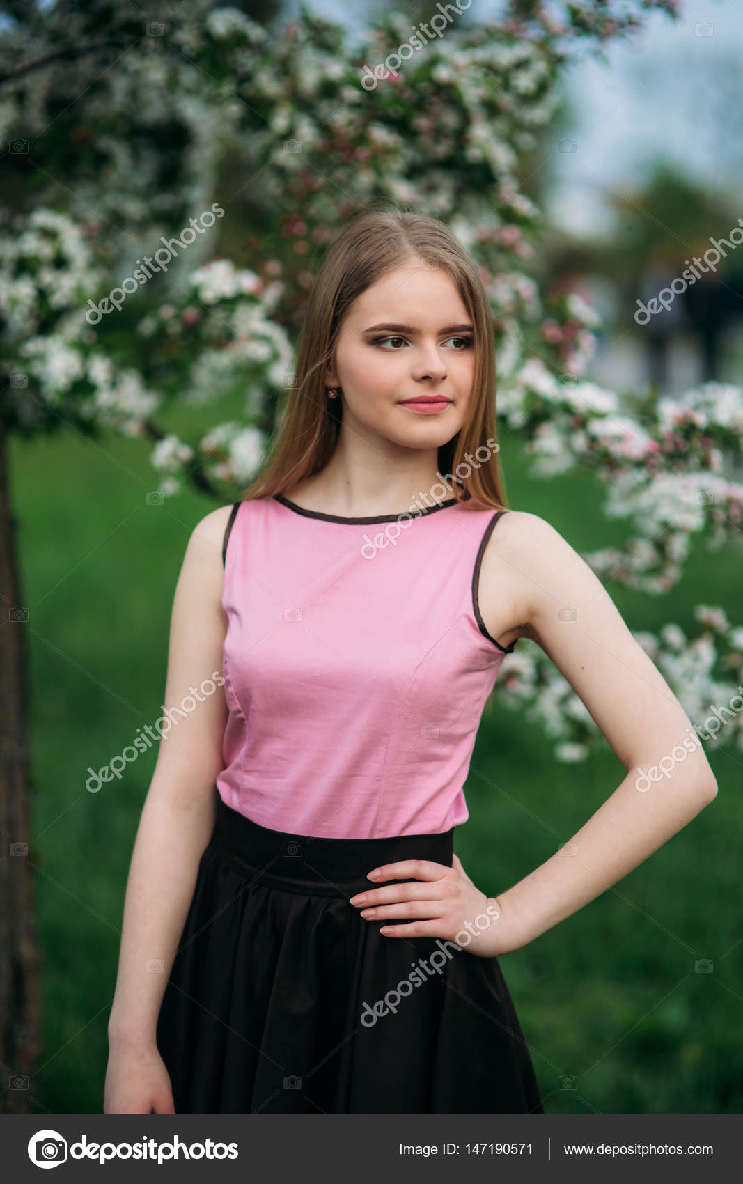 pink blouse and black skirt