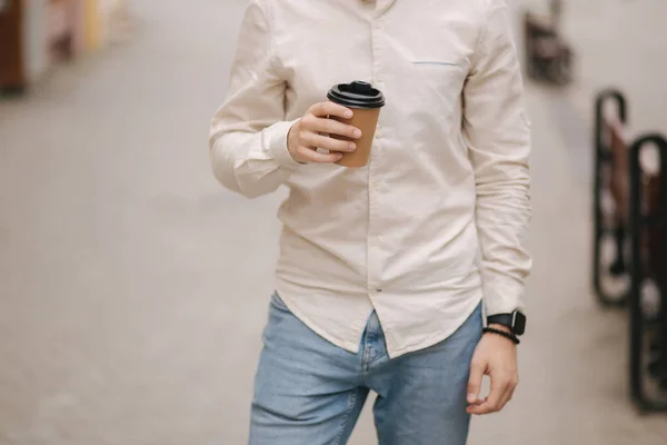 Middle selection of man stand in the city with cup of coffee — Stock Photo, Image