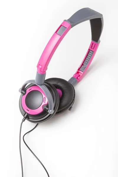 Kids pink audio headphones isolated over white background. — Stock Photo, Image
