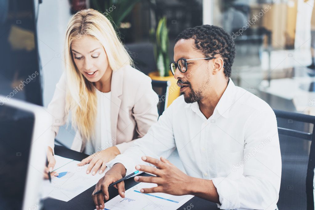 Young coworkers working in a modern office