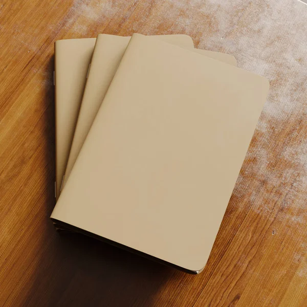 三个空白笔记本与棕色工艺纸盖在木桌上的概念。特写空水平样机。顶视图。3d 渲染 — 图库照片